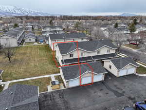 Birds eye view of property with a mountain view