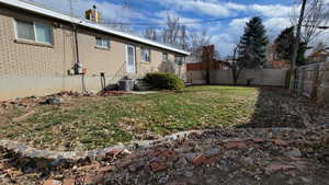 View of yard with central air condition unit