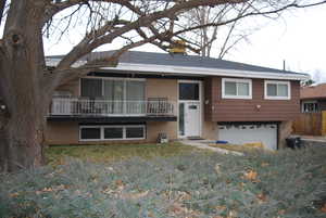 View of front of house with a garage