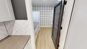 Bathroom featuring wood-type flooring