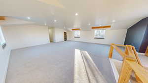 Interior space featuring light colored carpet