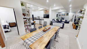 View of carpeted dining space