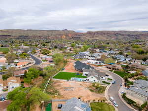 Birds eye view of property featuring a mountain view