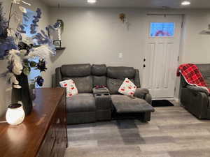 Living room with hardwood / wood-style floors