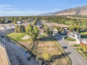 Birds eye view of property with a mountain view