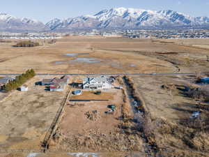 Drone / aerial view featuring a mountain view and a rural view