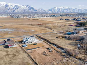 Drone / aerial view featuring a mountain view and a rural view