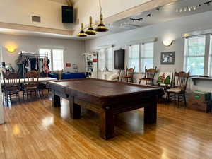 Rec room with pool table and light wood-type flooring