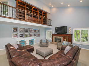 Family room with 2 story overlook library