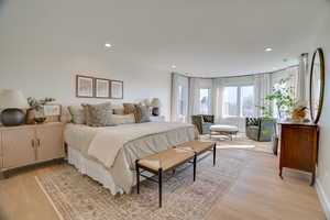 Bedroom featuring light wood-type flooring