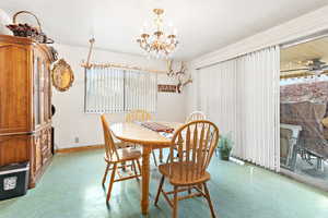 Dining room with a notable chandelier