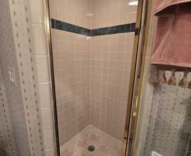 Bathroom with an enclosed shower