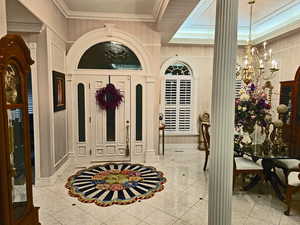 14' Tray Ceilings with lighting. Abundance of Leaded Glass throughout.