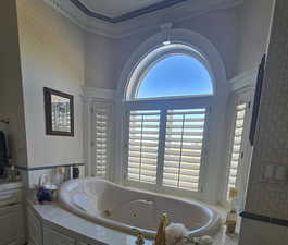 Bathroom featuring a relaxing tiled tub