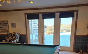 Recreation room with ornamental molding, carpet, and billiards