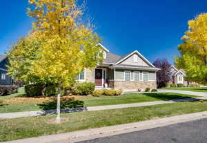 View of front of home featuring a front lawn