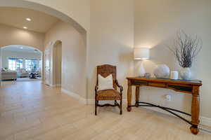 Sitting room with light hardwood / wood-style floors