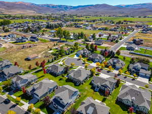 Birds eye view of property with a mountain view