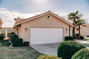 View of home's exterior with a garage