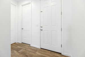 Hallway featuring light wood-type flooring