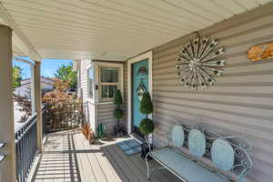 Wooden terrace with covered porch