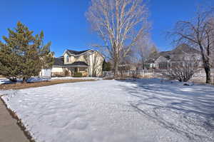 View of yard covered in snow