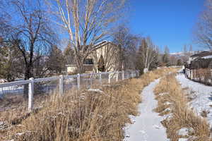 View of yard layered in snow