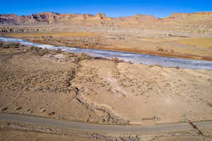 Property view of mountains featuring a water view