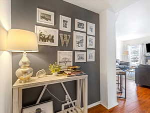 Hallway featuring hardwood / wood-style floors