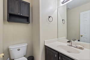 Bathroom with vanity and toilet