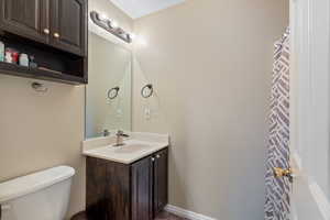 Bathroom with vanity and toilet