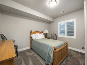 View of carpeted bedroom