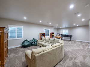 Living room featuring light carpet