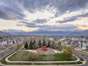 Aerial view at dusk featuring a mountain view