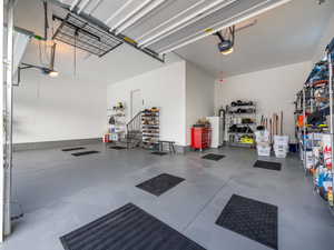 Garage featuring a garage door opener