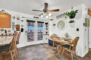 Dining area featuring ceiling fan