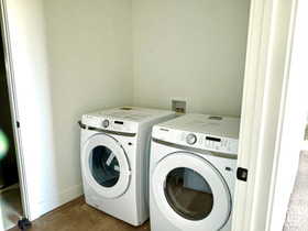 Laundry area featuring washer and clothes dryer