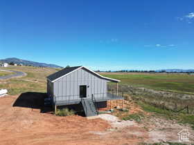 View of outdoor structure featuring a rural view