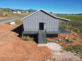 View of outbuilding featuring a mountain view