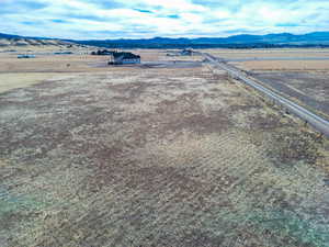 Aerial view featuring a mountain view and a rural view