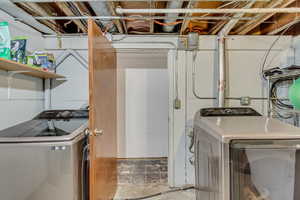 Laundry room featuring washer and dryer