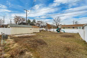 View of yard featuring a playground