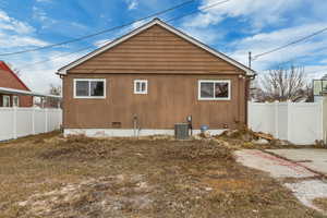 Back of house with cooling unit