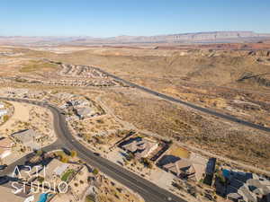 Drone / aerial view featuring a mountain view and golf course veiw