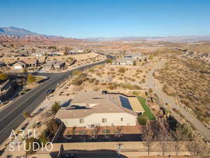 Drone / aerial view featuring a mountain and golf course view