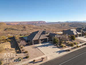 Bird's eye view with a mountain view and golf course view