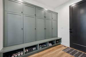 Mudroom with light wood-type flooring