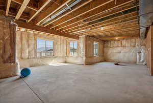 Miscellaneous room featuring concrete floors