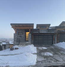 View of front of home with a garage