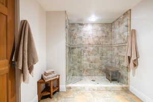 Bathroom featuring walk in shower